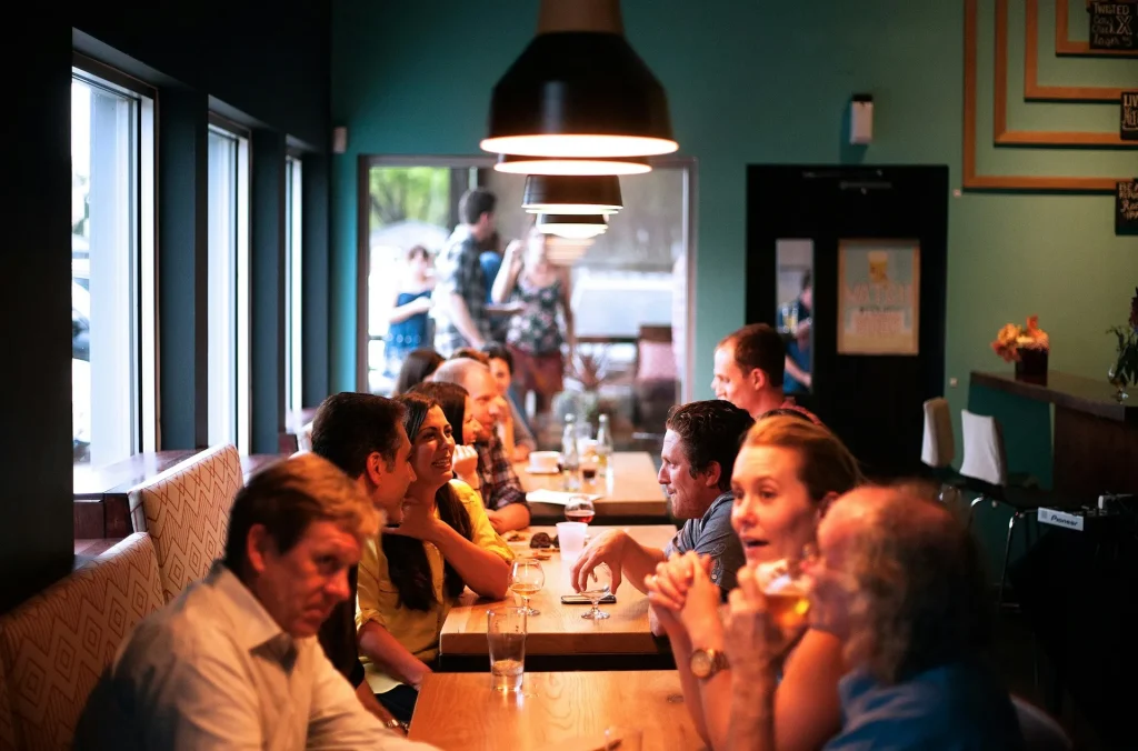 An illustration of when people gather in a living room, they often adjust the AC temperature to suit the number of occupants