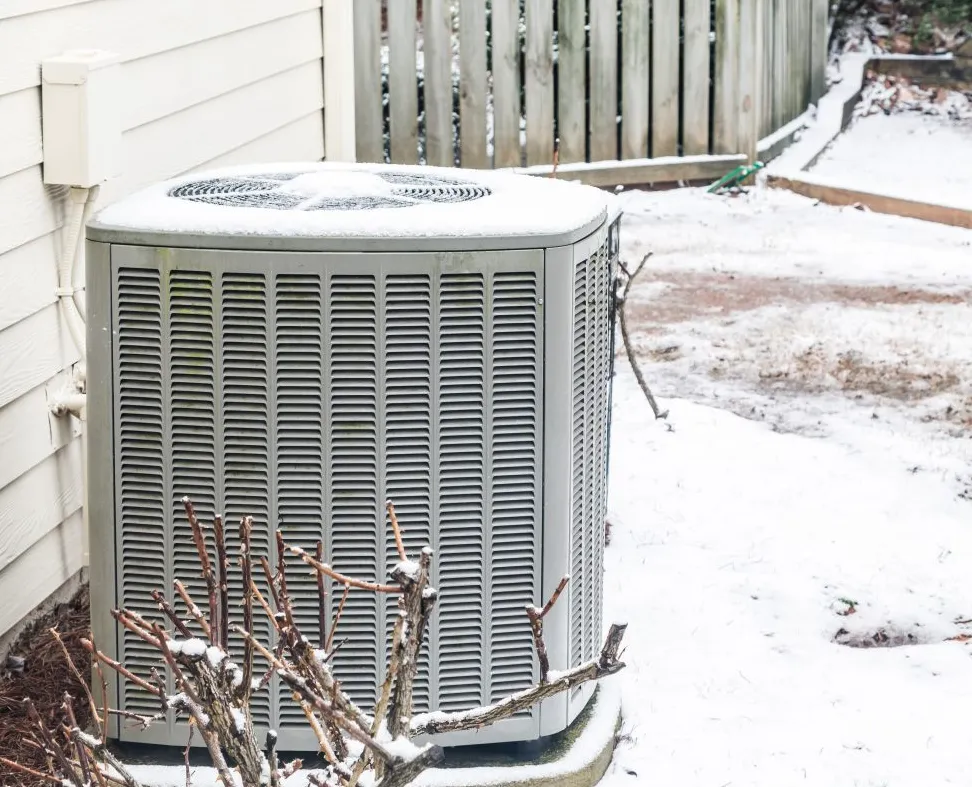 Heat pump with ice buildup on top can often become the cause of a heat pump heater not working