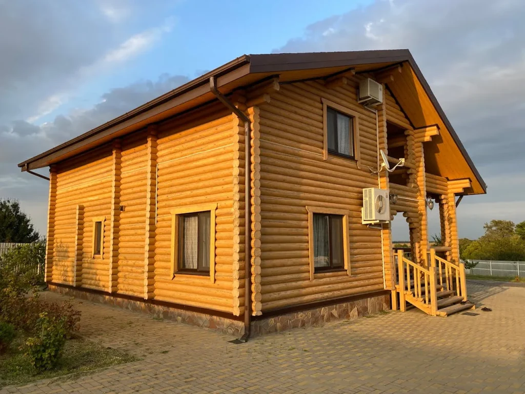 Outdoor air conditioner setup on wooden house