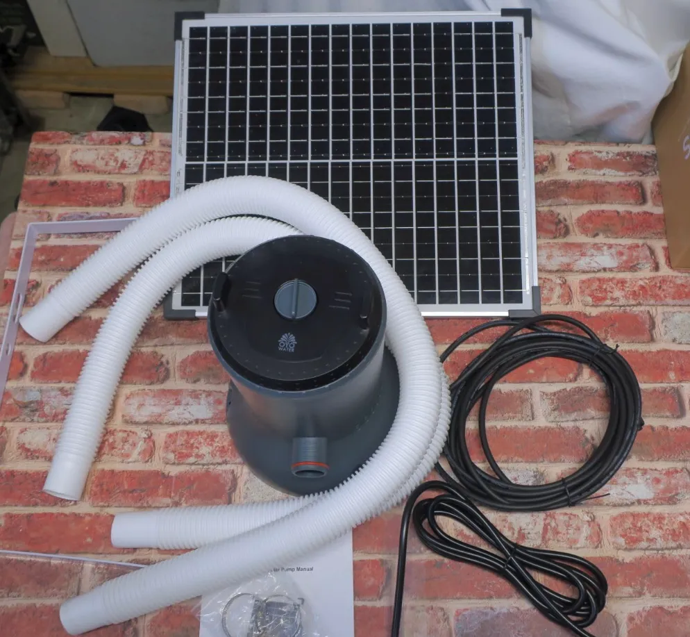 A complete solar-powered water pump kit with panel and hoses, an all-in-one solution for a low solar pool heating cost