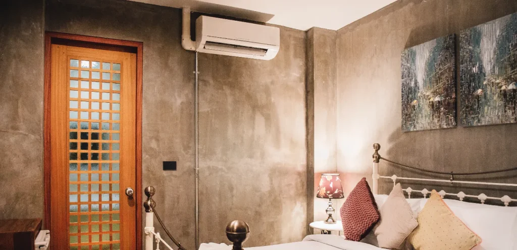 A wall-mounted ductless mini-split system often becomes a choice for old house