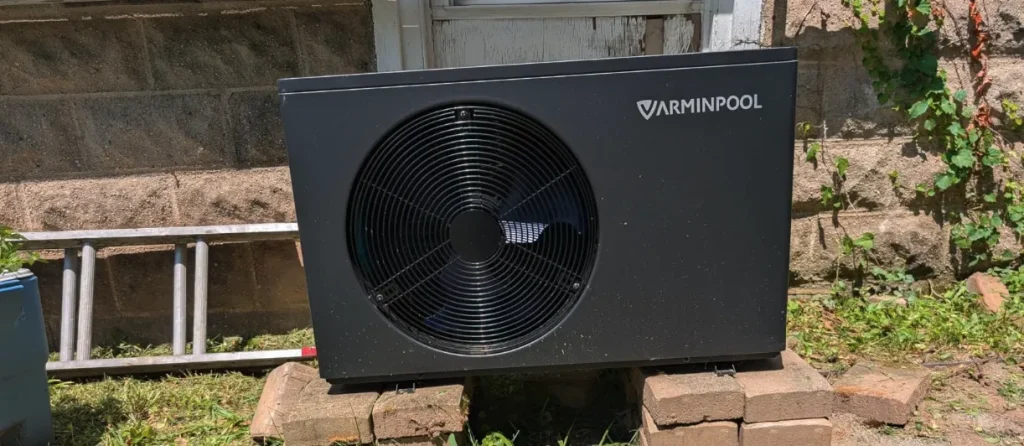 An example of an inverter pool heat pump in backyard