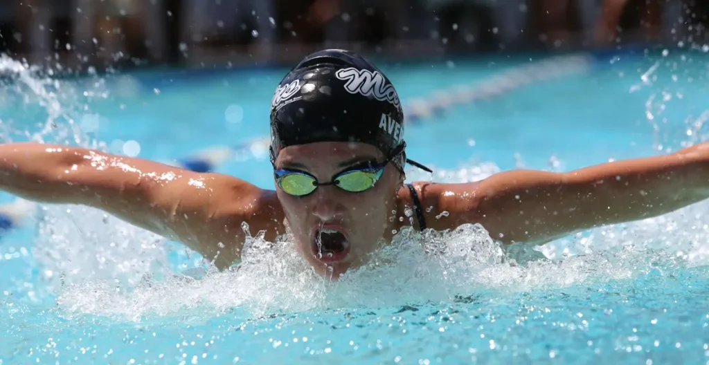 Someone is doing laps in a pool set to the ideal temperature