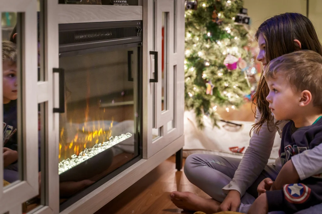 Children around gas fireplace