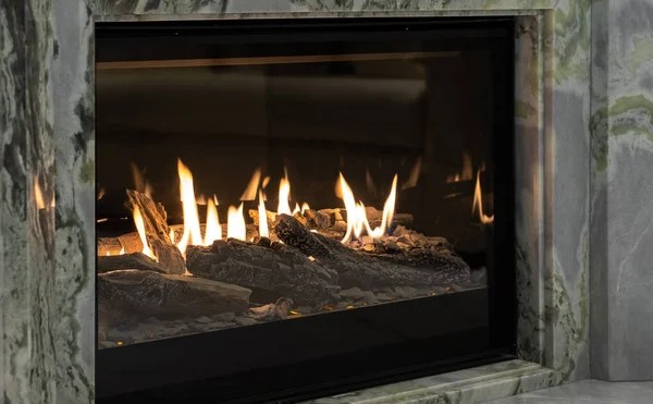 Burning gas fireplace in a residential home